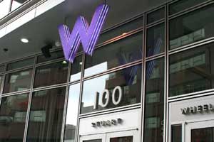 Another picture of the W architectural sign part of W Hotel branding and visual identity | CRA Graphic Design