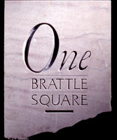 The architectural signage is a Carved stone fallowing One Brattle Square Logo | CRA design