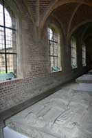 Museum Exhibit Design from Coco Raynes Associates, Inc. in Musee De La Chartreuse, Douai. Picture 1: Tomb accompanied by inscription readable by all 