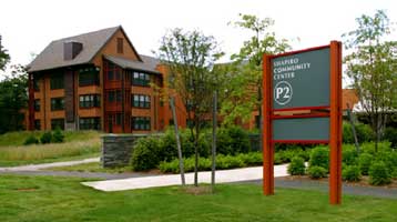 A wayfinding sign indicating direction